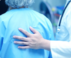 Background image of an healthcare professional accompanying a patient